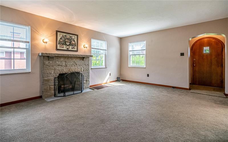 915 Wible Run Road Pittsburgh, PA 15209 - Photo 4 of 25 Living Room - Hardwood Floors Under Newer Carpet, Newer Windows, Freshly Painted