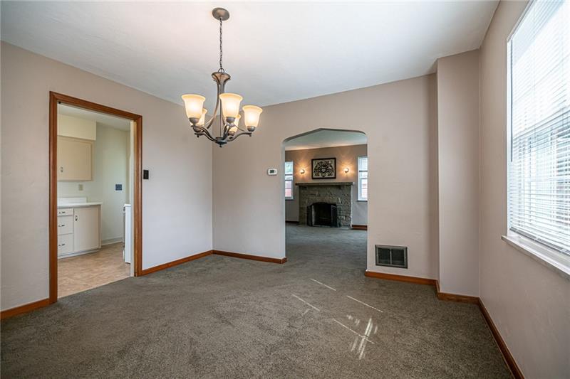 915 Wible Run Road Pittsburgh, PA 15209 - Photo 10 of 25 Dining Room Opens to Kitchen and Living Room