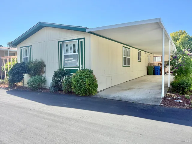 front view of a house and a yard