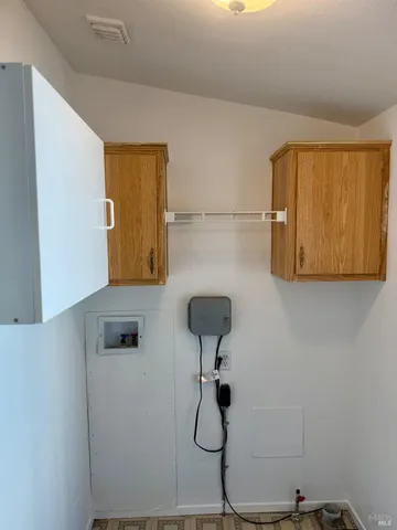 a bathroom with a shower and a sink