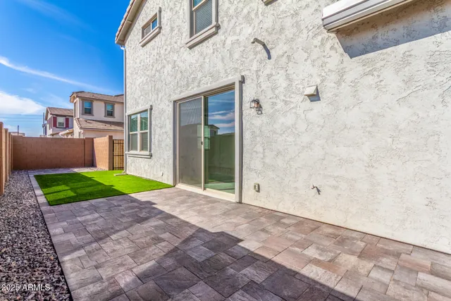 a view of backyard with a garden and plants