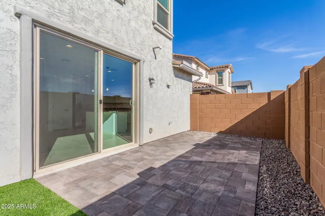 a view of a backyard of a house