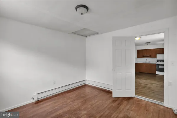 a view of a kitchen with a sink and dishwasher