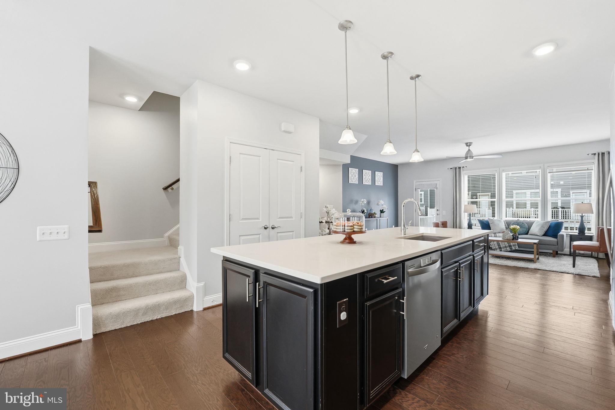 17354 Redshank Road Dumfries, VA 22026 - Photo 19 of 65 a kitchen with a sink and stove