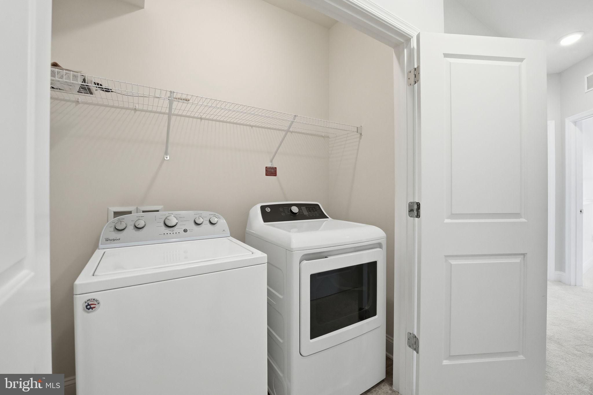 17354 Redshank Road Dumfries, VA 22026 - Photo 27 of 65 a utility room with dryer and washer