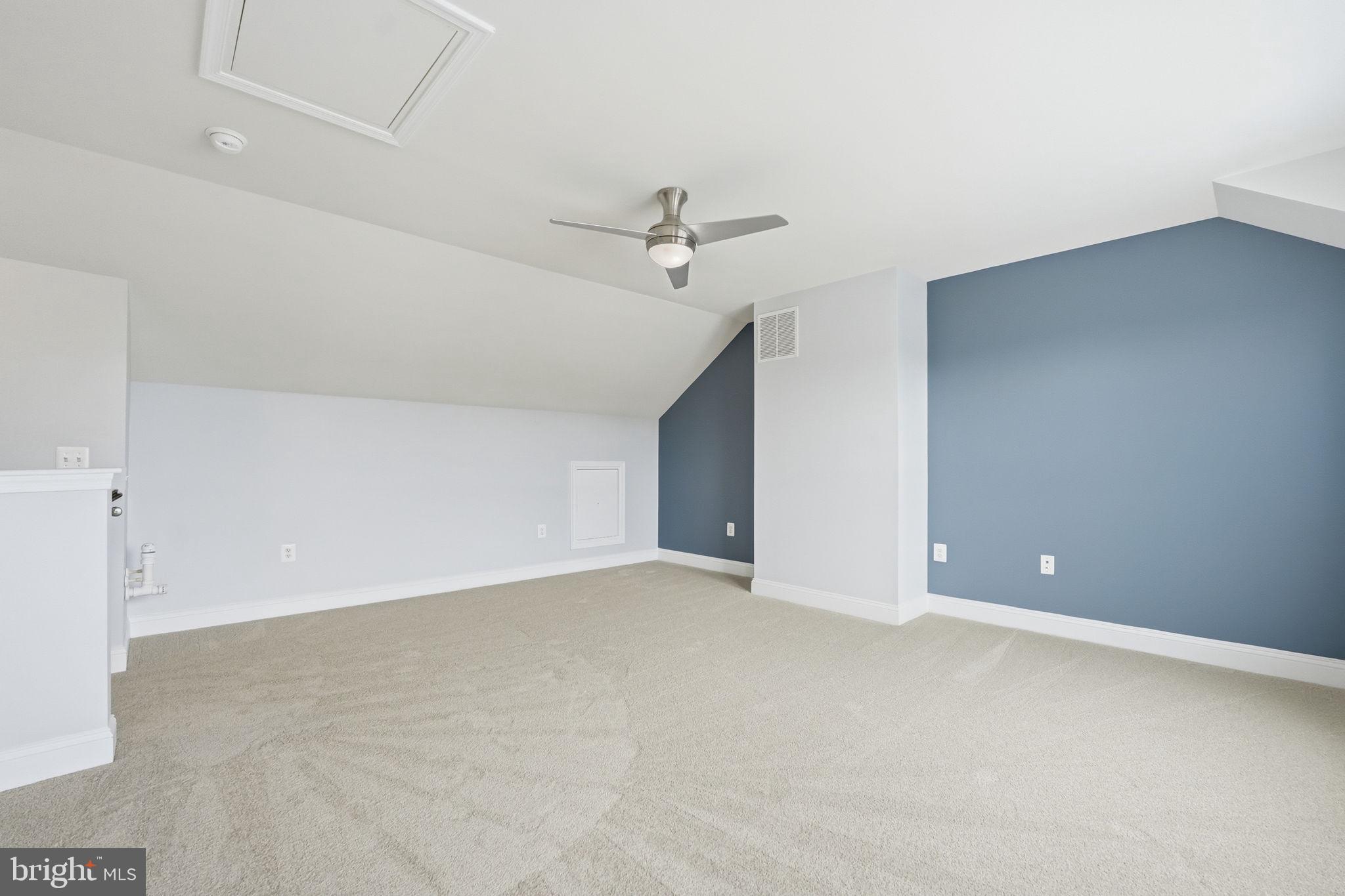 17354 Redshank Road Dumfries, VA 22026 - Photo 37 of 65 an empty room with a ceiling fan and a window