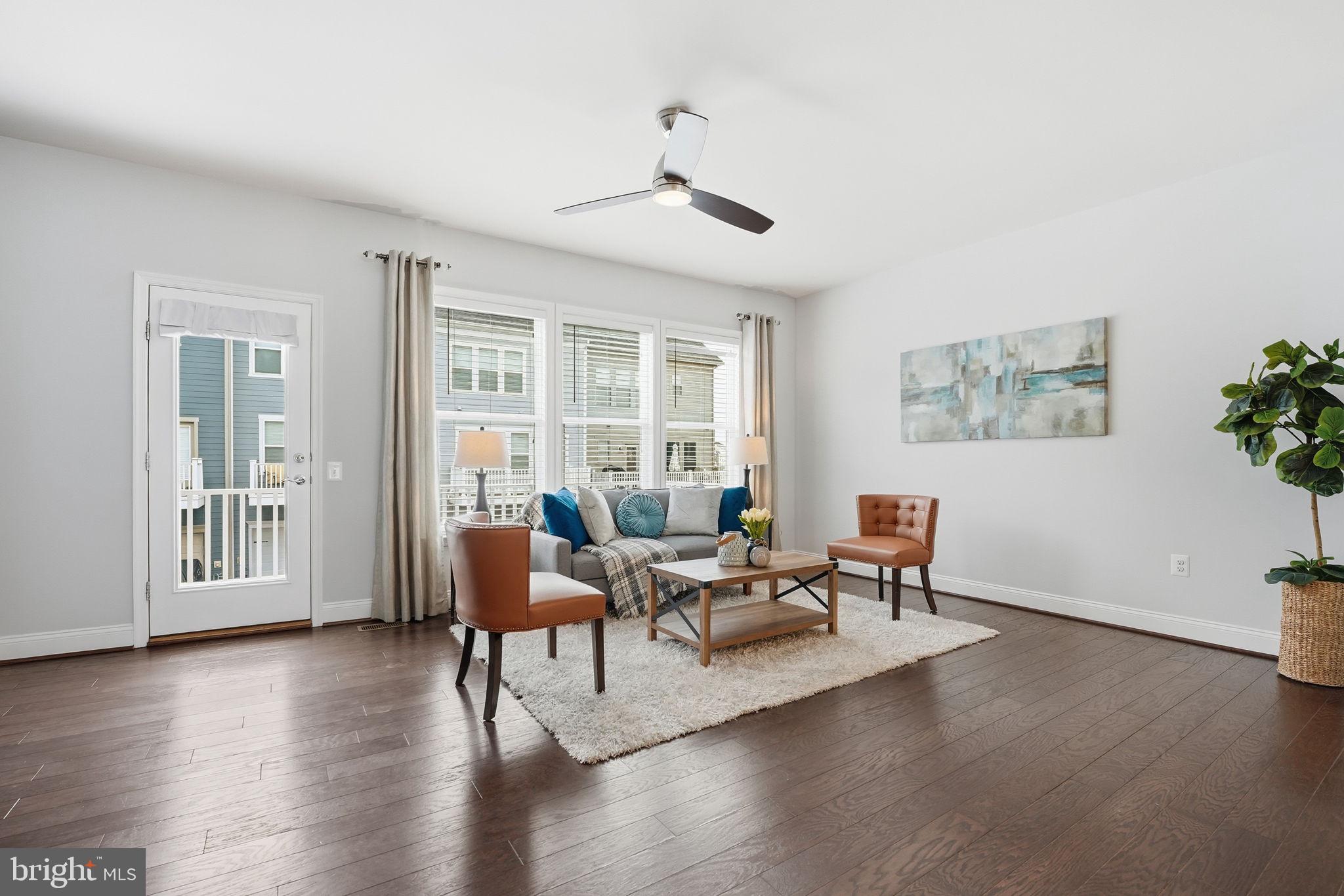 17354 Redshank Road Dumfries, VA 22026 - Photo 8 of 65 a living room with furniture and a window