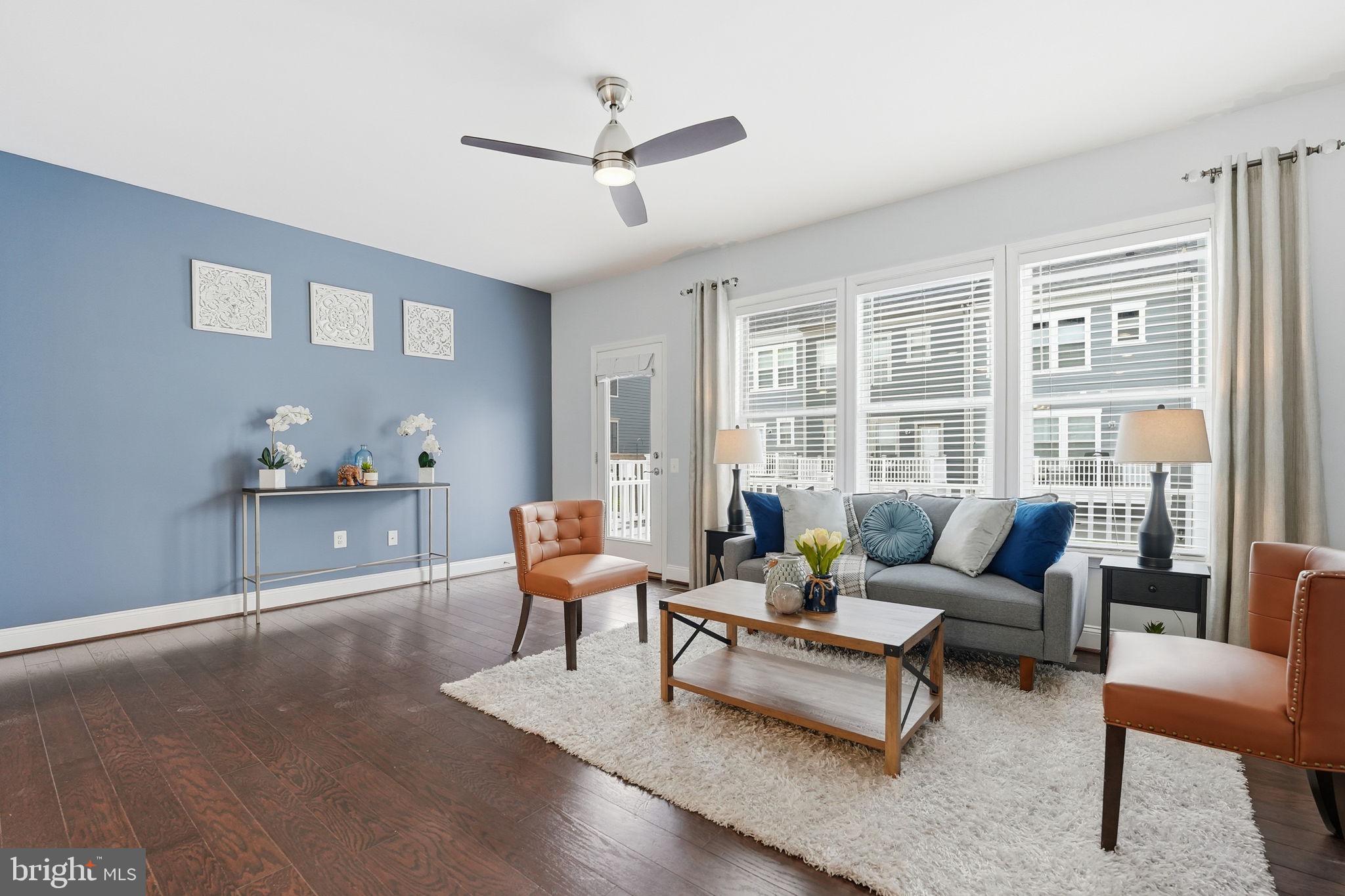17354 Redshank Road Dumfries, VA 22026 - Photo 9 of 65 a living room with furniture and a window
