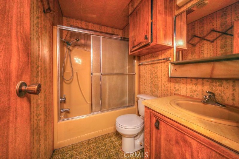 55743 Mitchell Road Anza, CA 92539 - Photo 23 of 46 a bathroom with a sink a toilet and shower