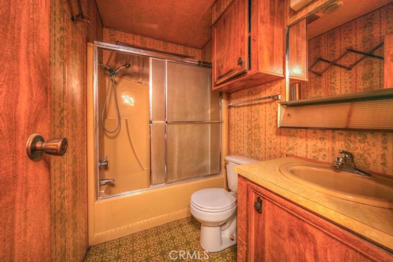 55743 Mitchell Road Anza, CA 92539 - Photo 23 of 46 a bathroom with a sink a toilet and shower