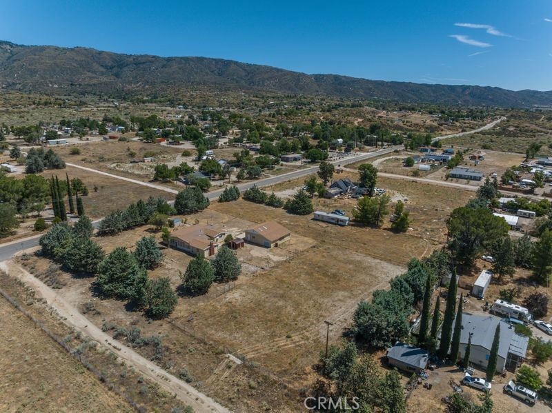 55743 Mitchell Road Anza, CA 92539 - Photo 36 of 46 an aerial view of residential houses with outdoor space and trees