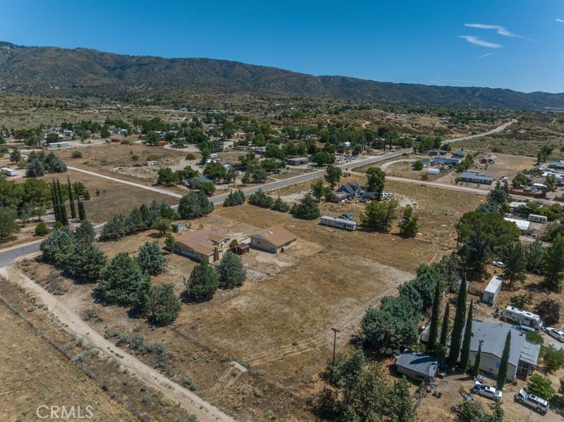 55743 Mitchell Road Anza, CA 92539 - Photo 36 of 46 an aerial view of residential houses with outdoor space and trees