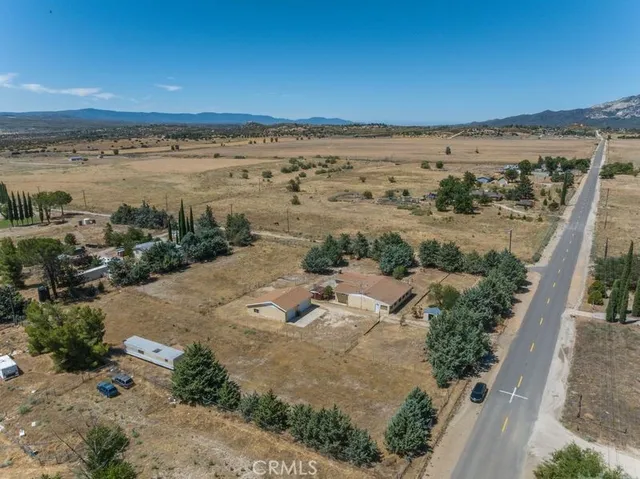 a view of a city street view with ocean