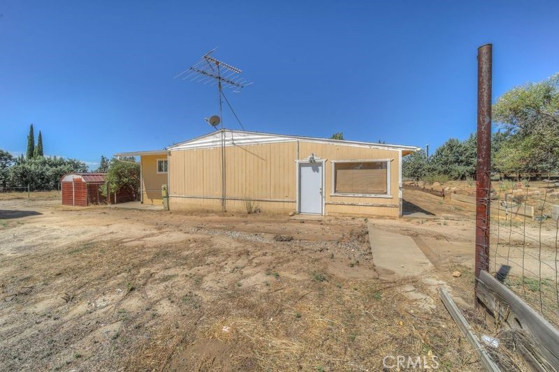 55743 Mitchell Road Anza, CA 92539 - Photo 5 of 46 a view of a house with a backyard