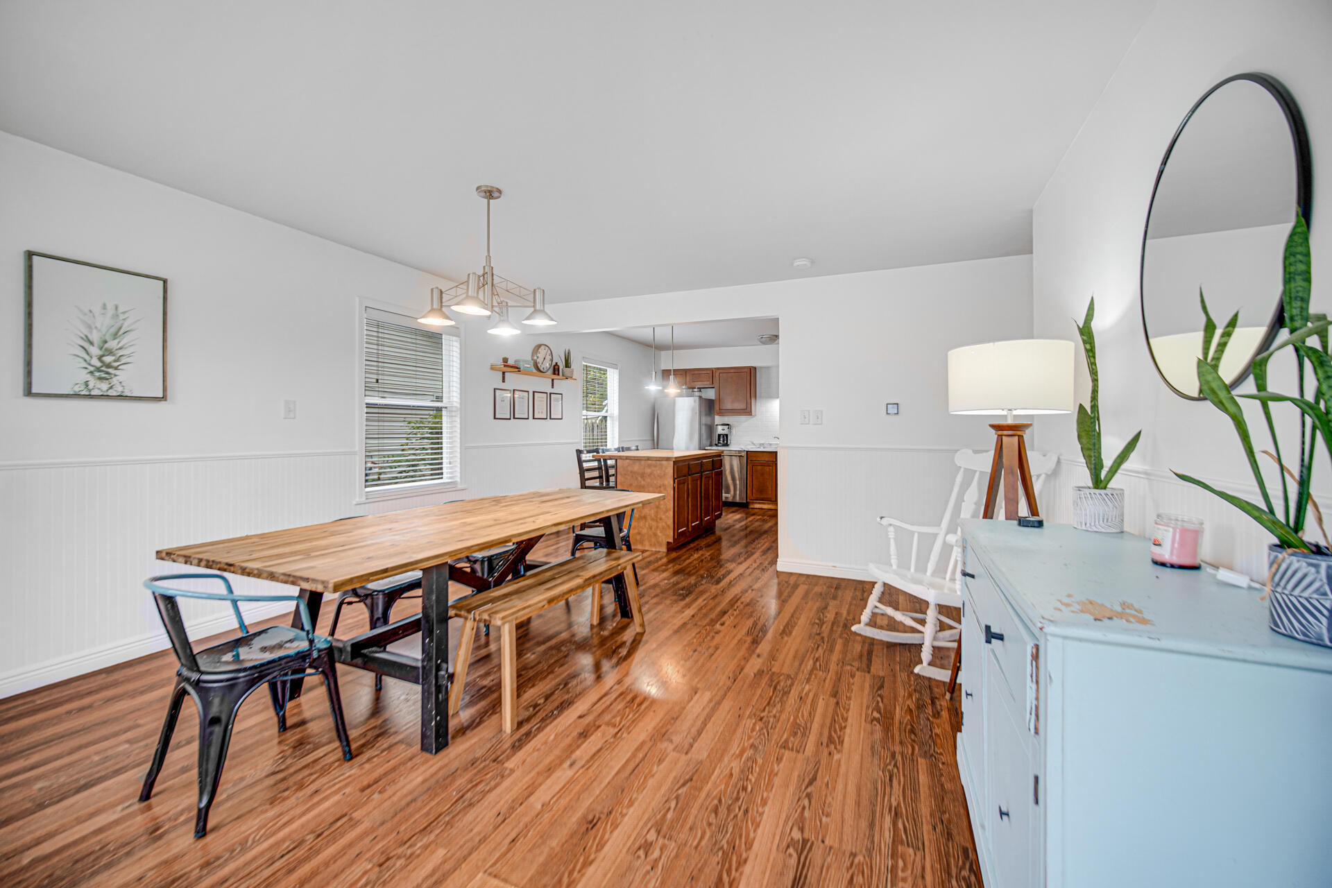 2009 West Porter Avenue Chesterton, IN 46304 - Photo 11 of 21 a dining room with furniture a chandelier and wooden floor