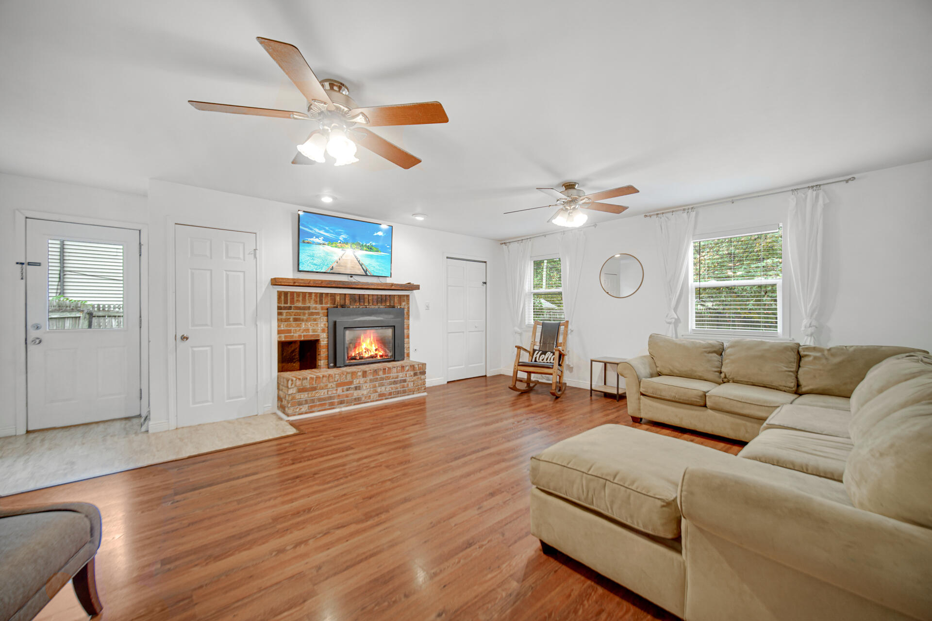 2009 West Porter Avenue Chesterton, IN 46304 - Photo 4 of 21 a living room with furniture a fireplace and a window