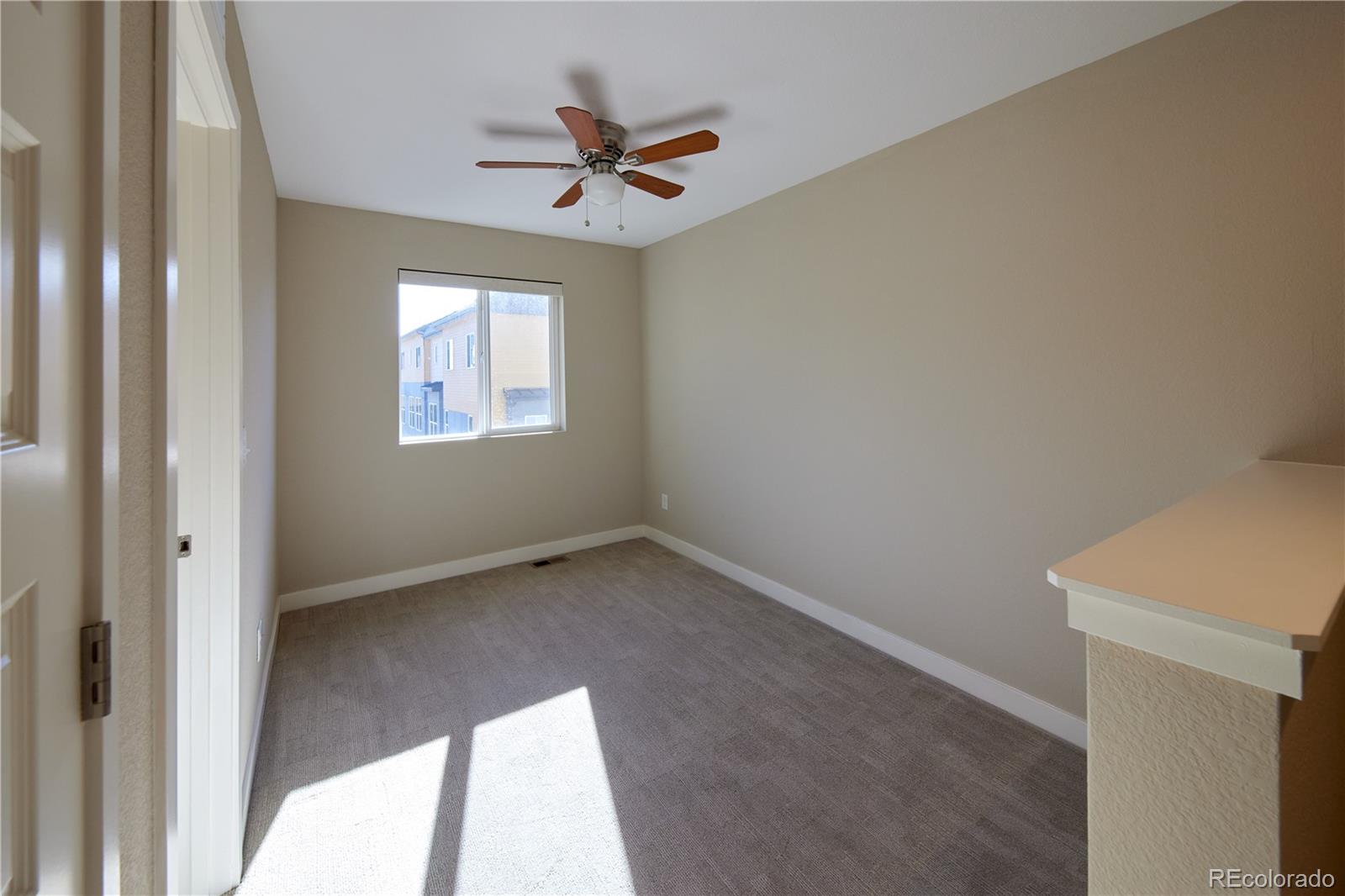 11225 Colony Row Broomfield, CO 80021 - Photo 14 of 31 a view of a livingroom with a window