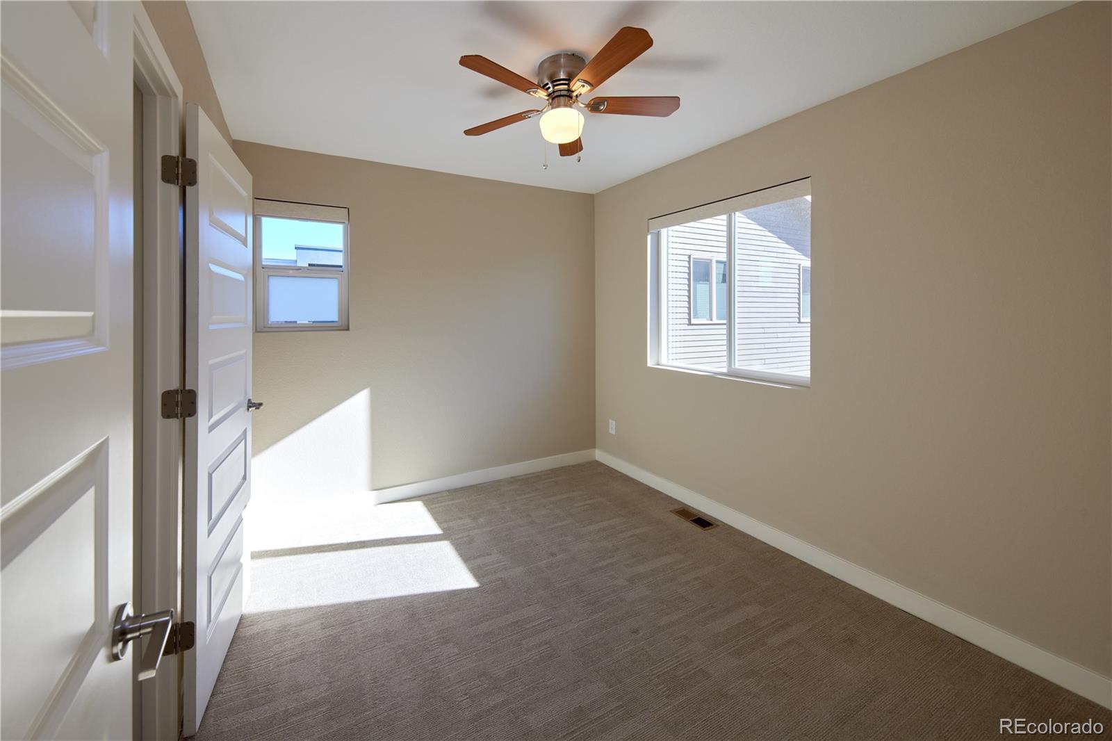 11225 Colony Row Broomfield, CO 80021 - Photo 15 of 31 a view of an empty room with a window