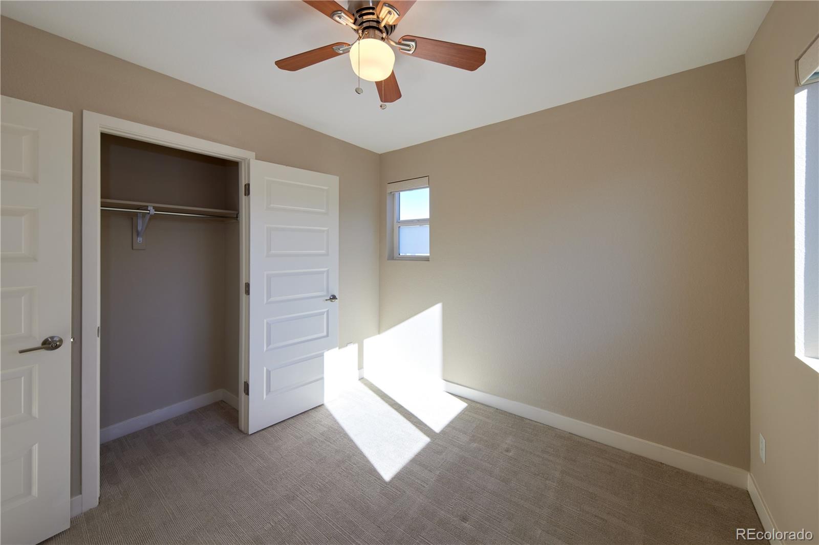 11225 Colony Row Broomfield, CO 80021 - Photo 16 of 31 a view of an empty room with a window