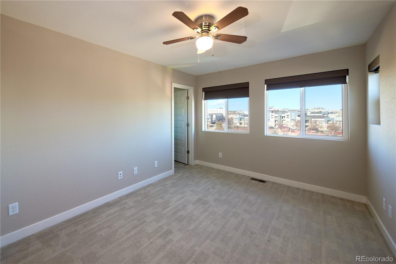11225 Colony Row Broomfield, CO 80021 - Photo 19 of 31 a view of an empty room with a window