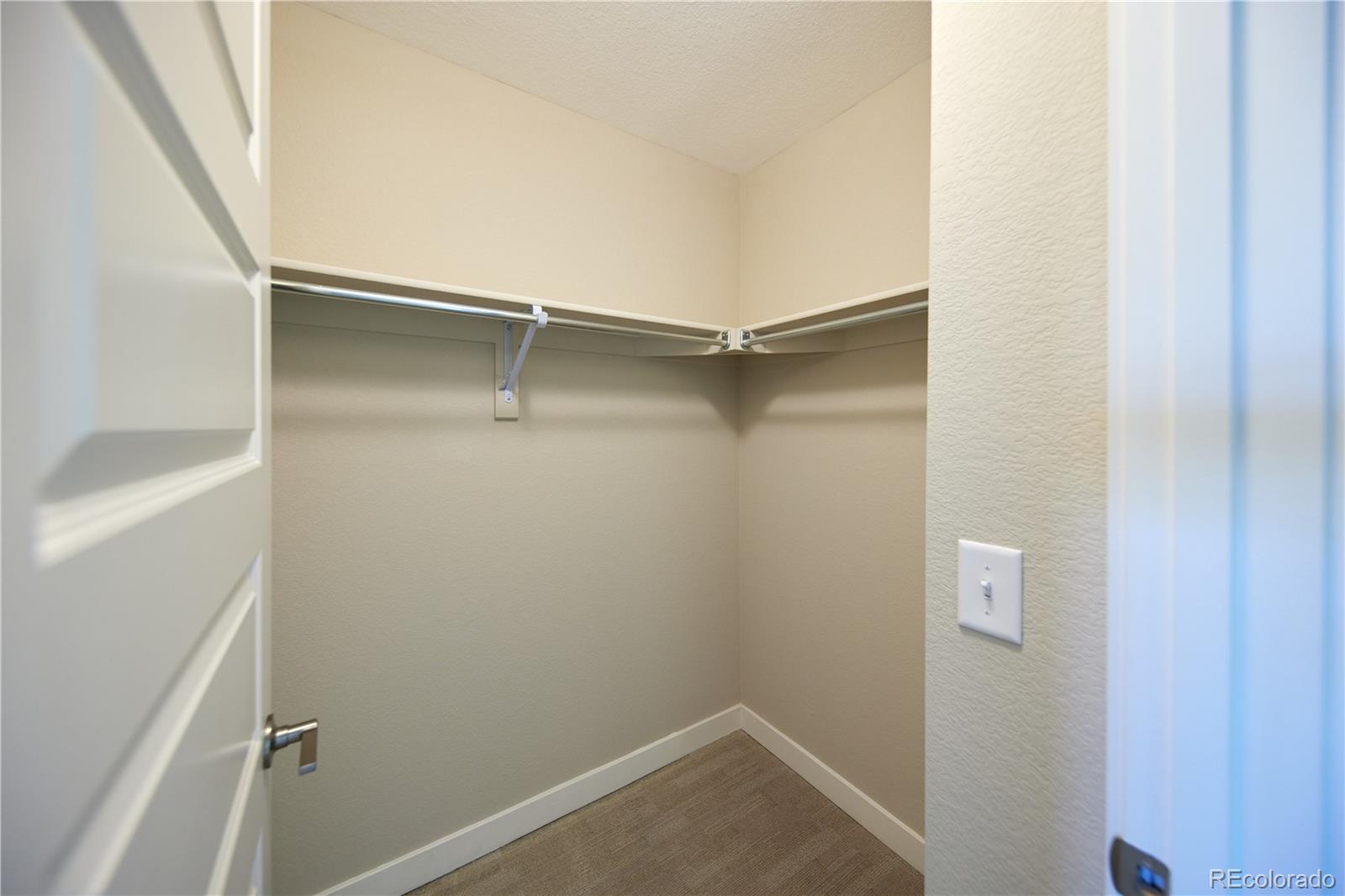 11225 Colony Row Broomfield, CO 80021 - Photo 20 of 31 a view of an empty walk in closet