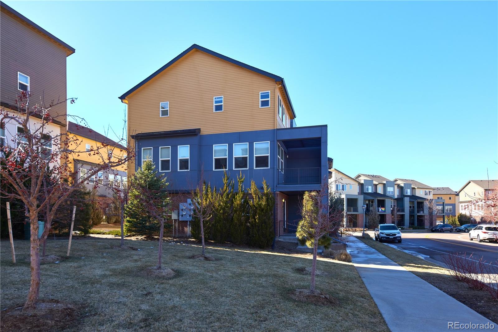 11225 Colony Row Broomfield, CO 80021 - Photo 26 of 31 a front view of a house with a yard