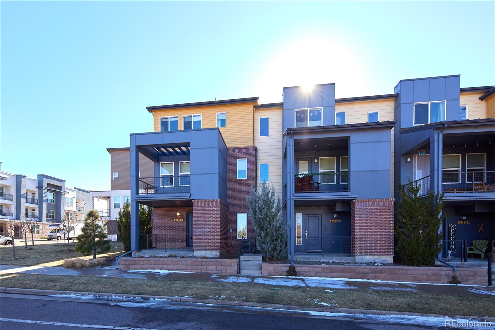 11225 Colony Row Broomfield, CO 80021 - Photo 28 of 31 a front view of a multi story building