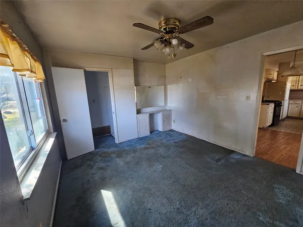 a view of a livingroom with a staircase