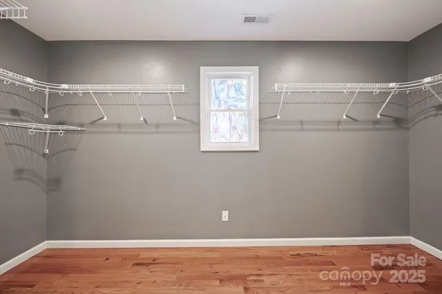 a view of a room with racks on the wall