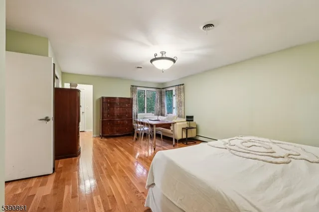 a bed room with a bed and furniture