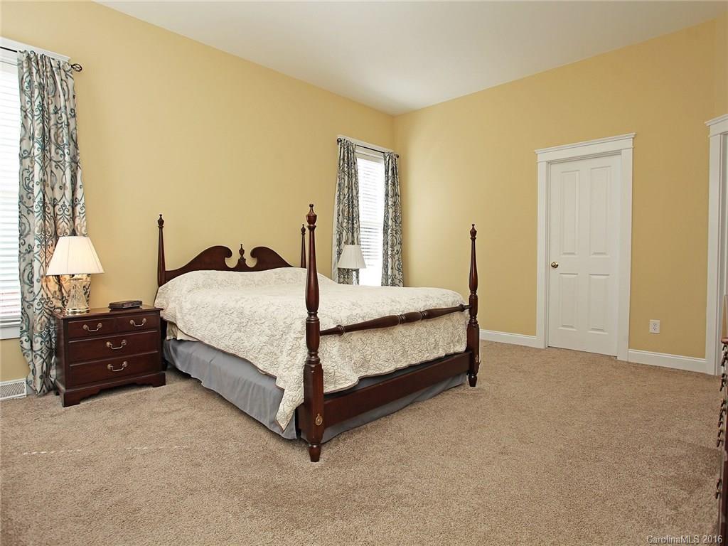 1865 2nd Baxter Crossing Fort Mill, SC 29708 - Photo 18 of 24 a bedroom with a bed and window