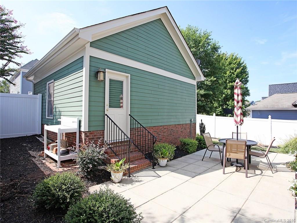 1865 2nd Baxter Crossing Fort Mill, SC 29708 - Photo 24 of 24 a view of a patio with table and chairs and potted plants