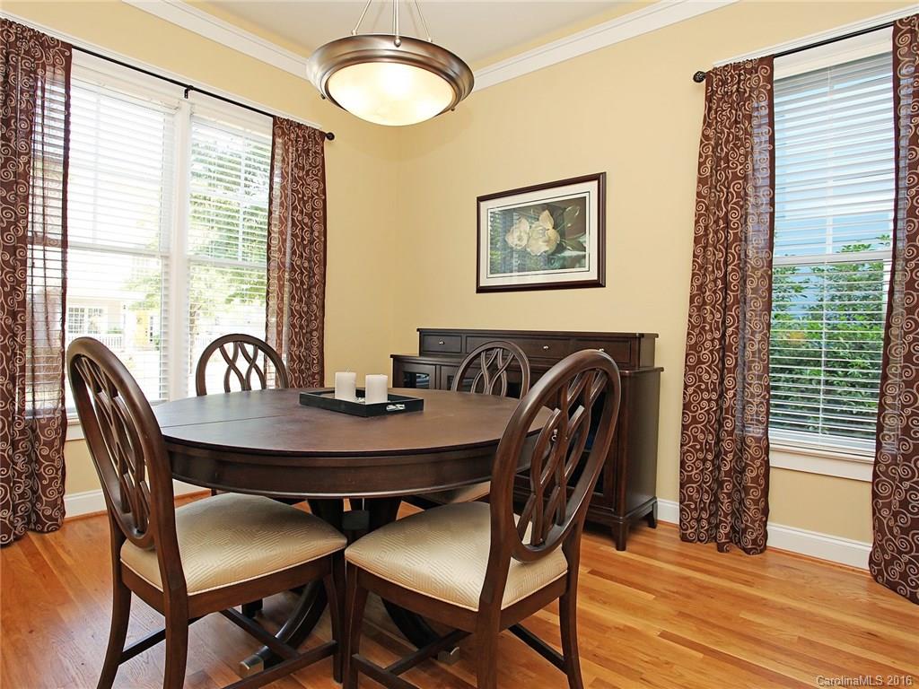 1865 2nd Baxter Crossing Fort Mill, SC 29708 - Photo 9 of 24 a view of a a dining room with furniture window and wooden floor