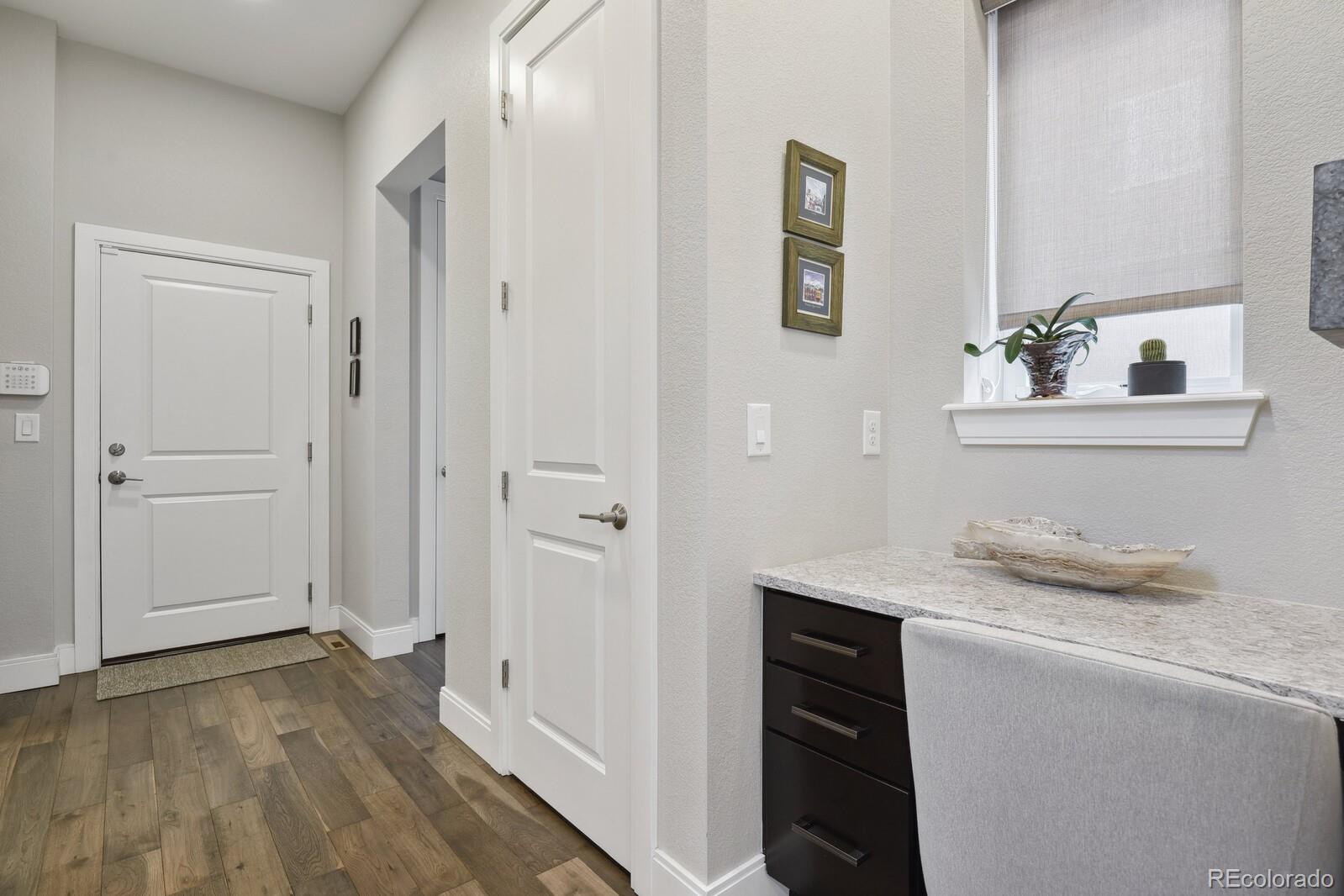 76 Niagara Street Denver, CO 80230 - Photo 17 of 44 a bathroom with a granite countertop sink