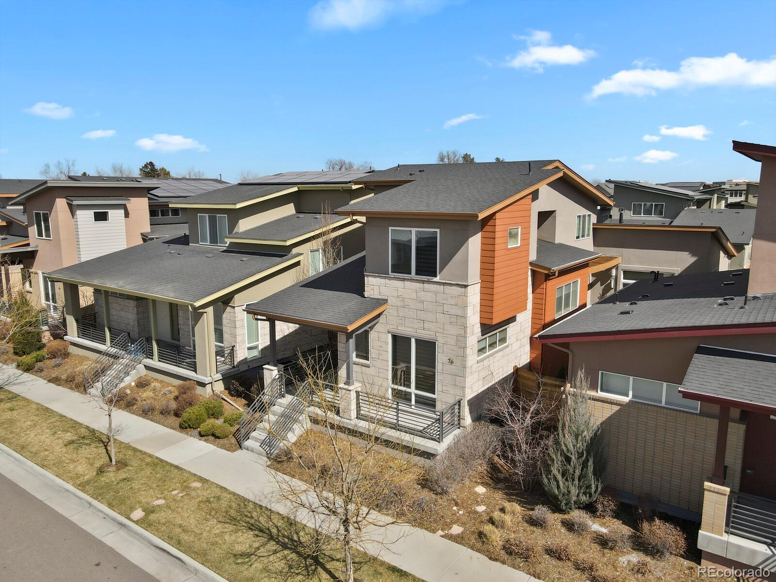 76 Niagara Street Denver, CO 80230 - Photo 3 of 44 front view of a house with a street