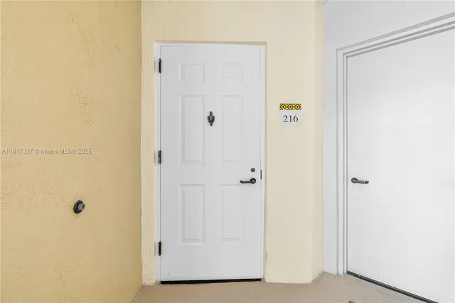 a kitchen with stainless steel appliances granite countertop a refrigerator a stove a sink and dishwasher