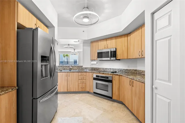 a view of a balcony with a ceiling fan
