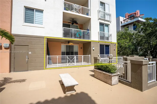 an aerial view of a house with a lake view