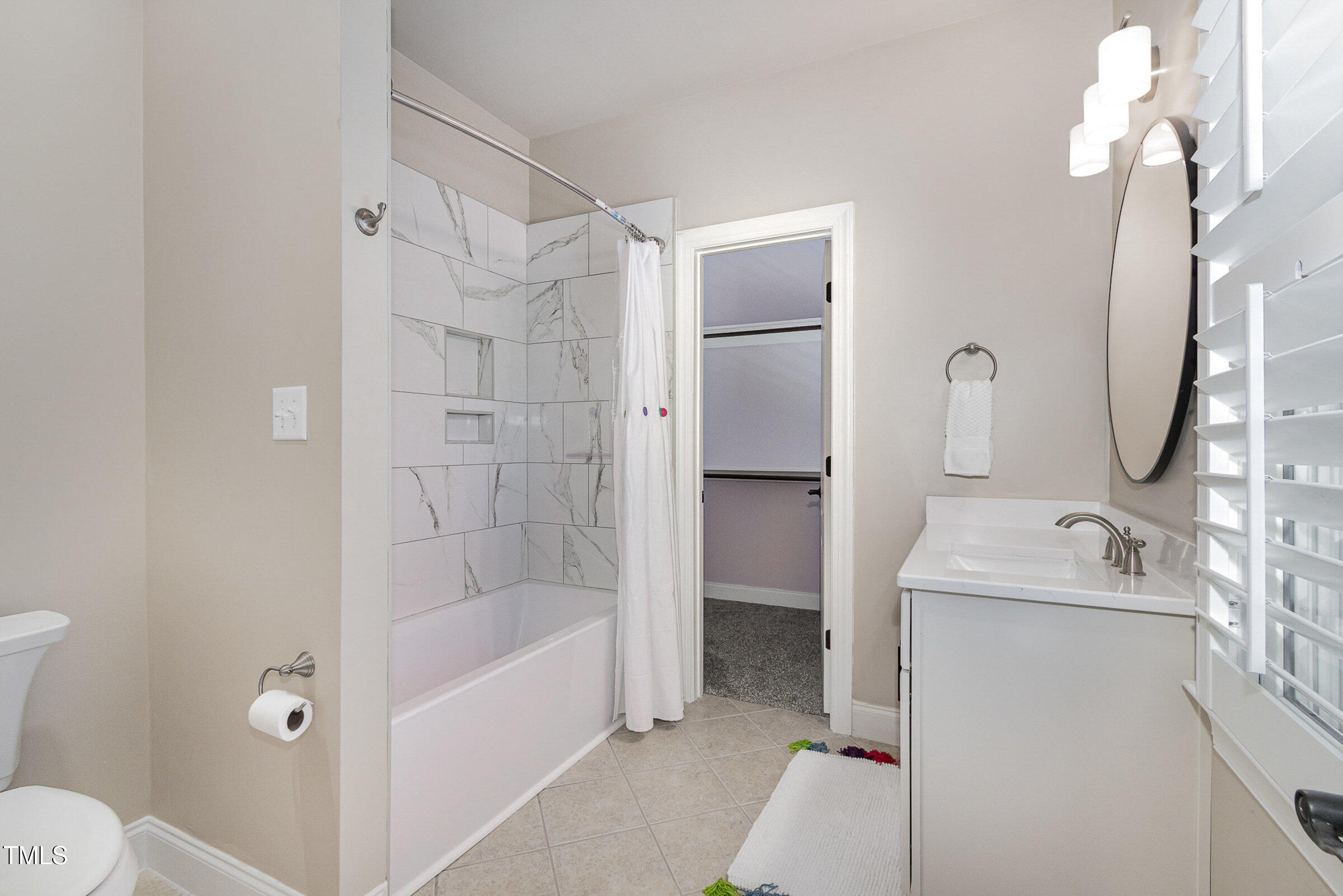 2027 Hopeton Avenue Raleigh, NC 27614 - Photo 23 of 33 Bathroom/Closet - Looking from second bedroom