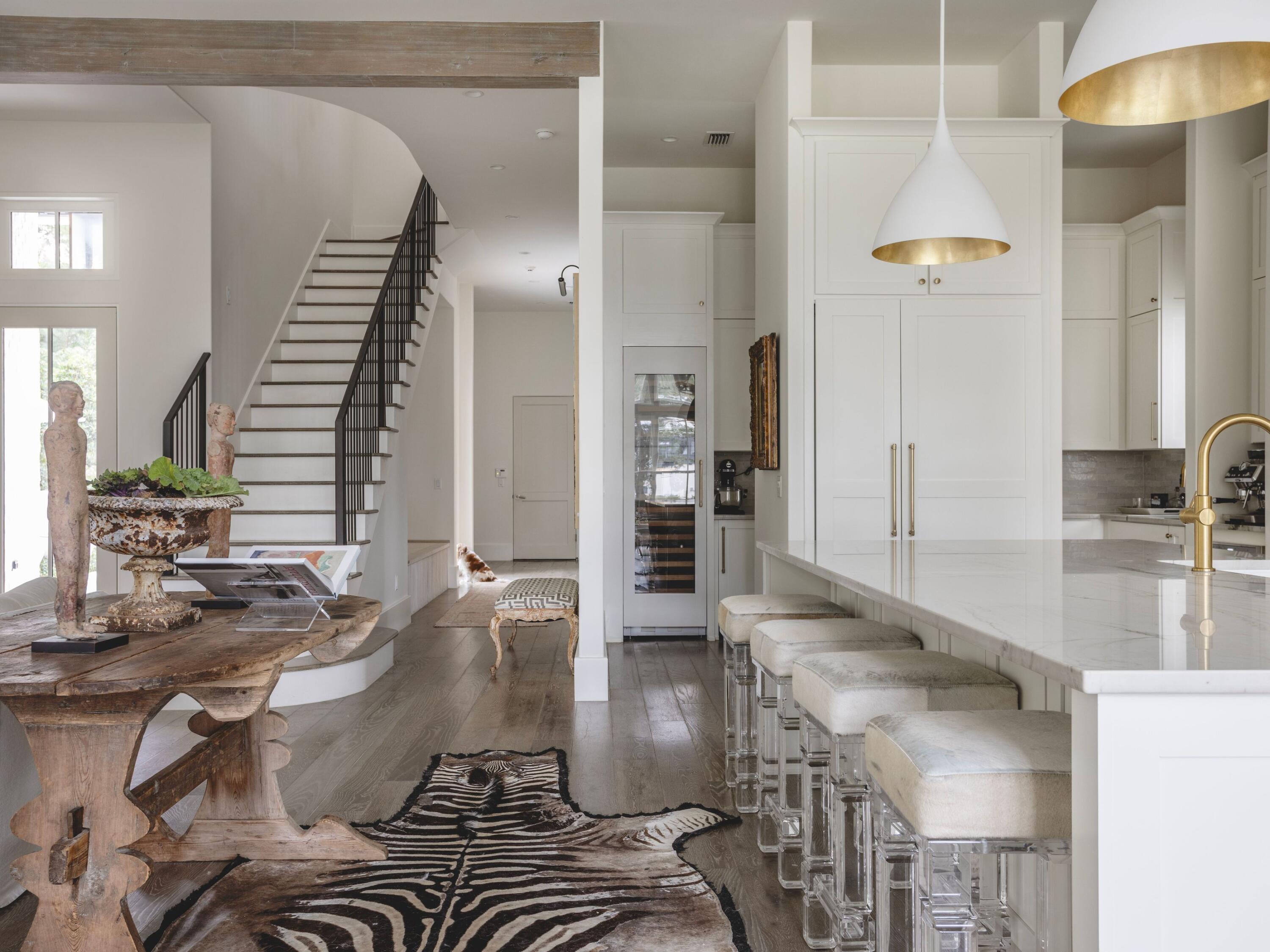 a kitchen with stainless steel appliances granite countertop a sink and a stove