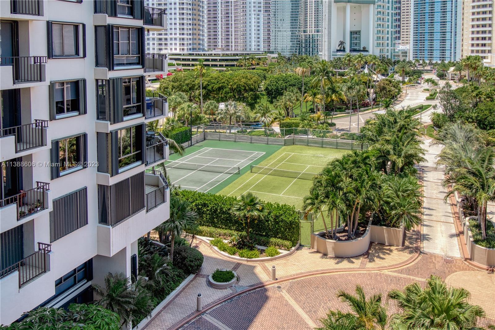 520 Brickell Key Drive, Unit A810 Miami, FL 33131 - Photo 6 of 20 a view of a building with a garden
