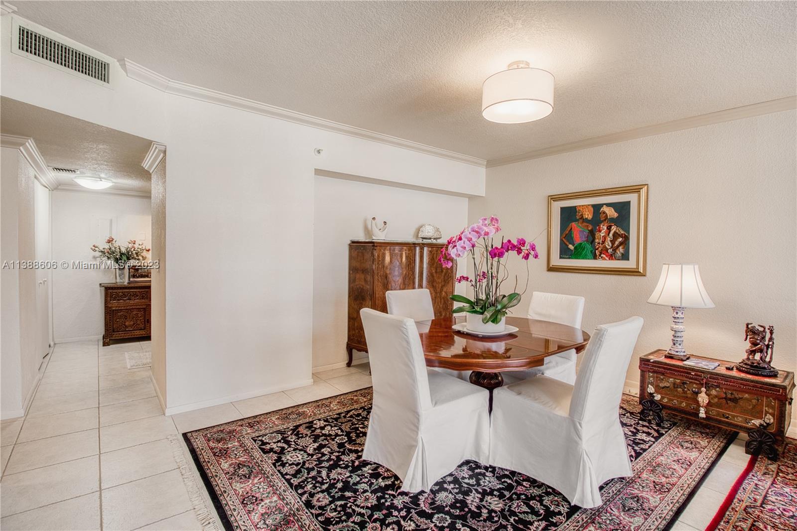 520 Brickell Key Drive, Unit A810 Miami, FL 33131 - Photo 9 of 20 a dining room with furniture and window