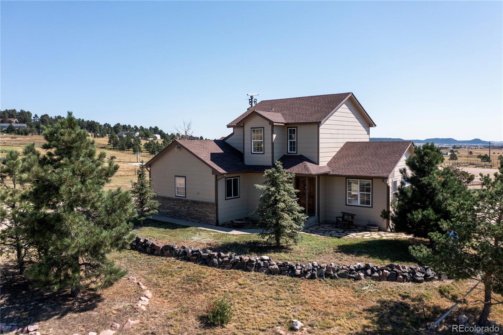 14965 Tanner Trail Elbert, CO 80106 - Photo 2 of 40 front view of house