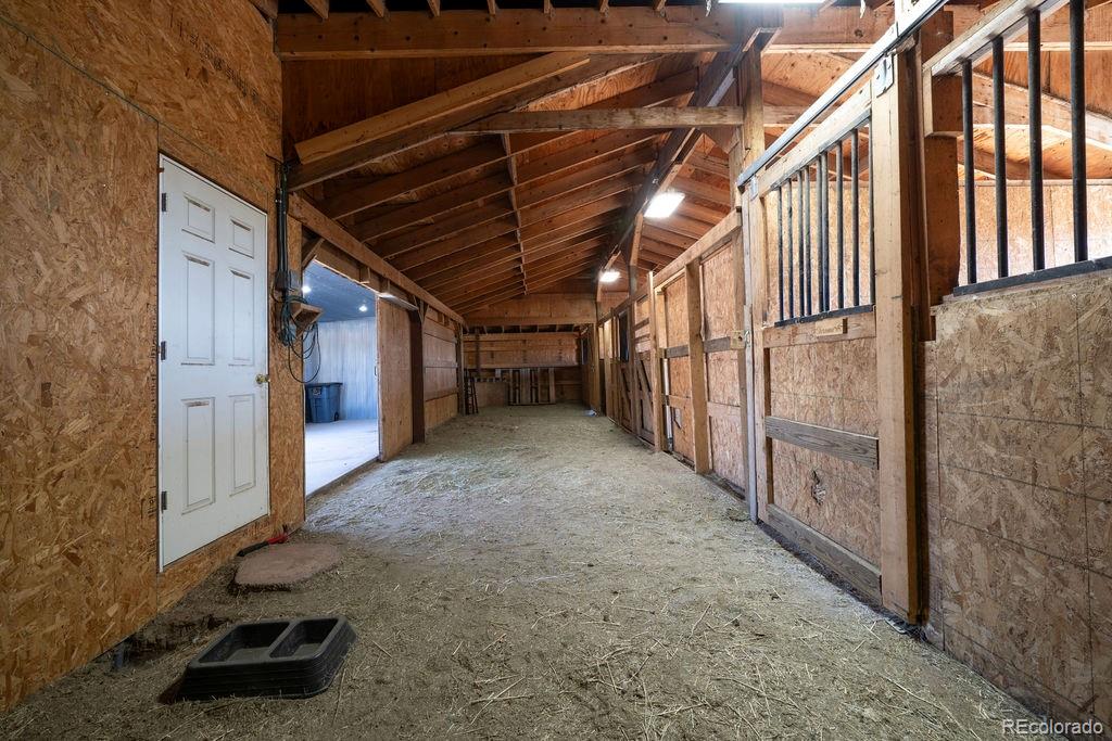 14965 Tanner Trail Elbert, CO 80106 - Photo 35 of 40 a view of an empty room with wooden floor