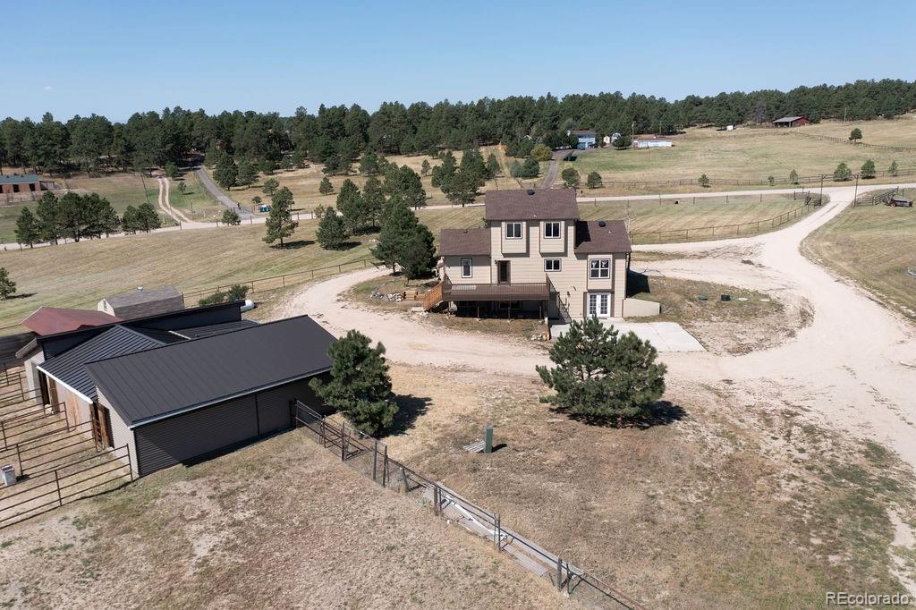 14965 Tanner Trail Elbert, CO 80106 - Photo 38 of 40 a view of a lake with a car parked