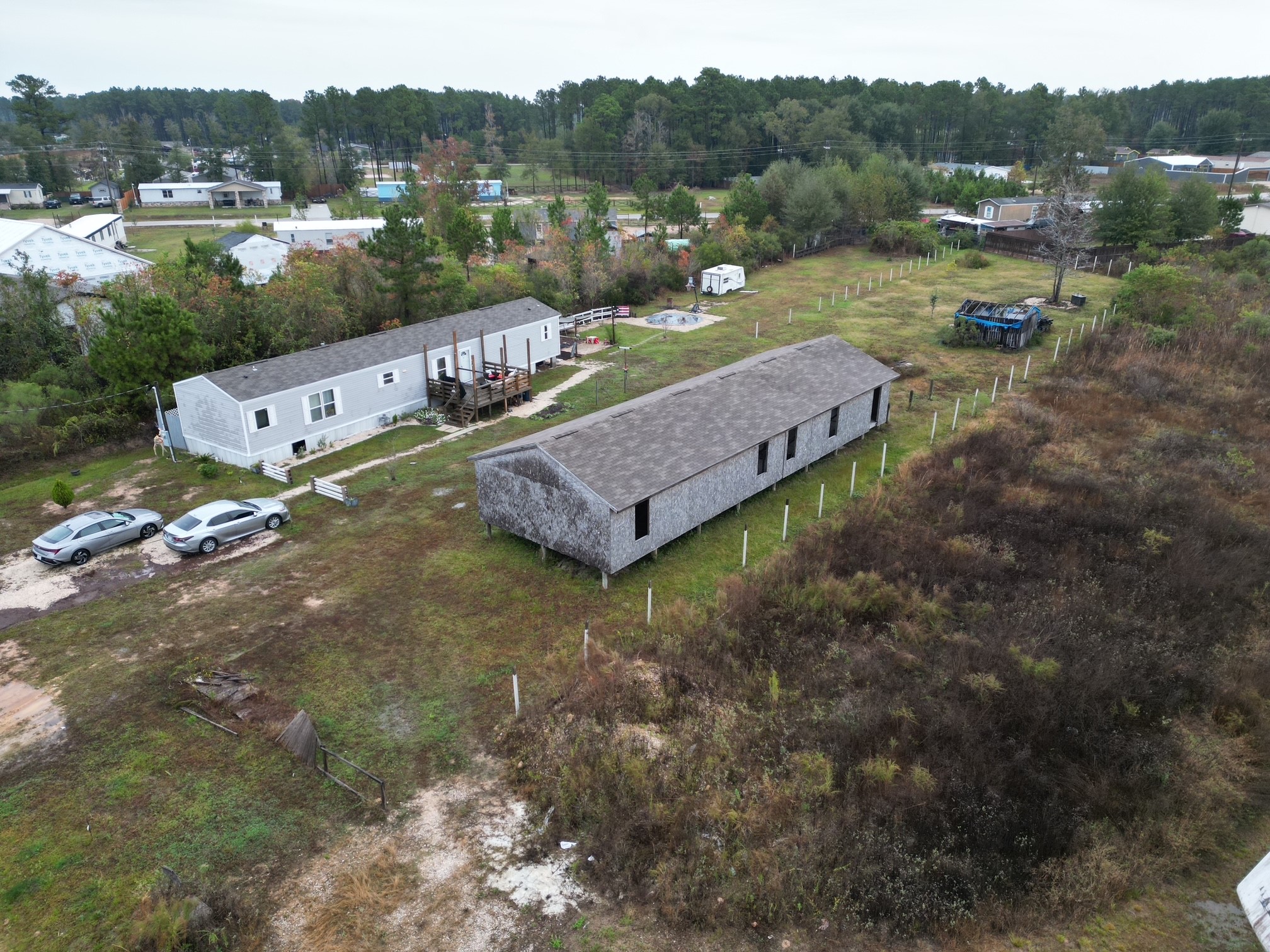 a view of a table and chairs in the yard