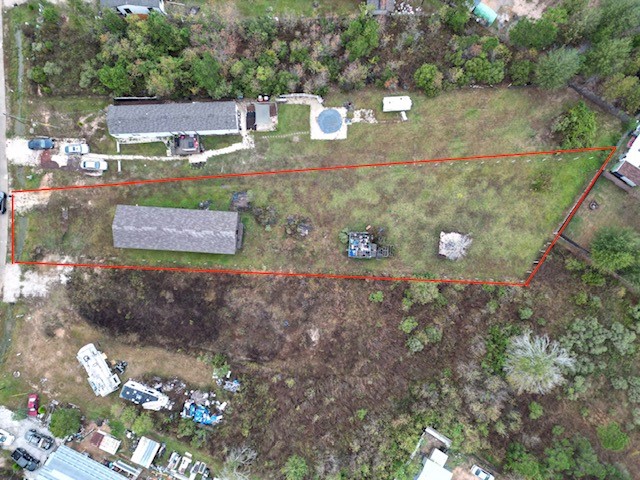 364 West 5102 H Road West Cleveland, TX 77327 - Photo 13 of 13 a view of a house with a yard