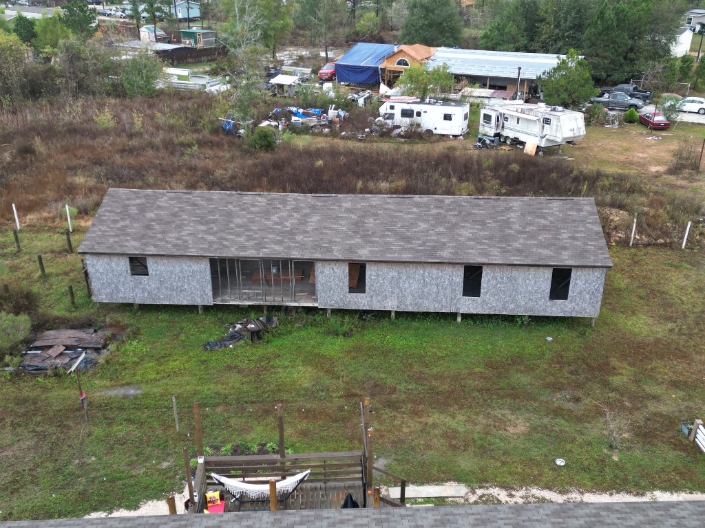 364 West 5102 H Road West Cleveland, TX 77327 - Photo 3 of 13 a view of backyard with outdoor seating ad green space