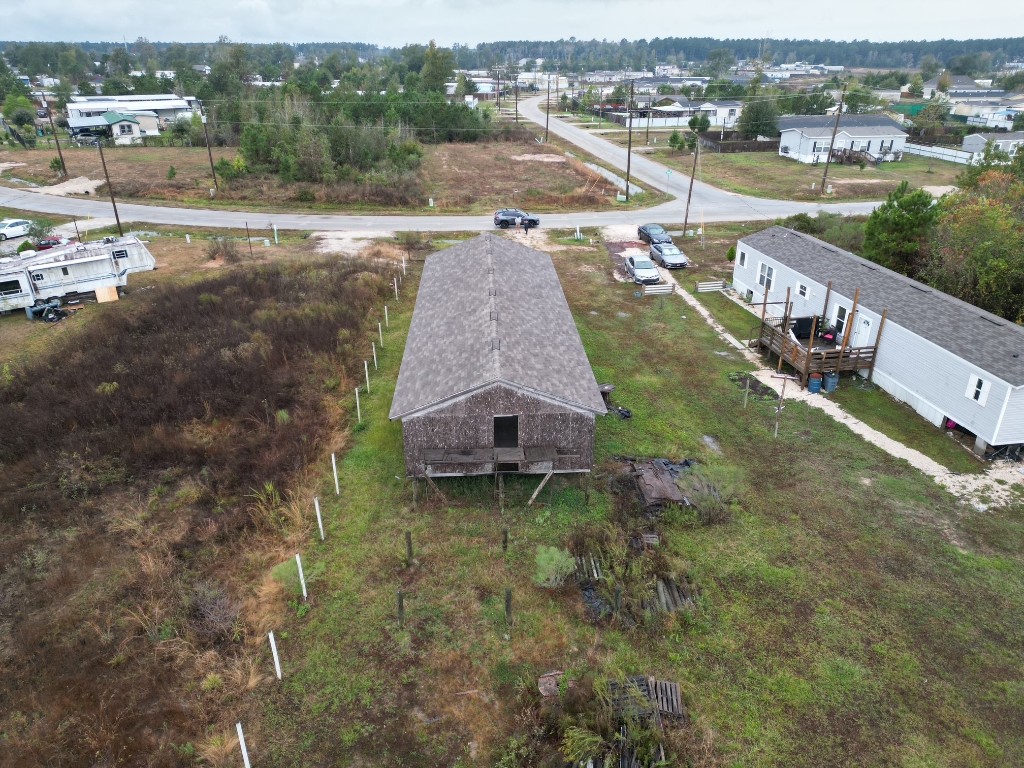 364 West 5102 H Road West Cleveland, TX 77327 - Photo 6 of 13 an aerial view of a house with a yard and lake view