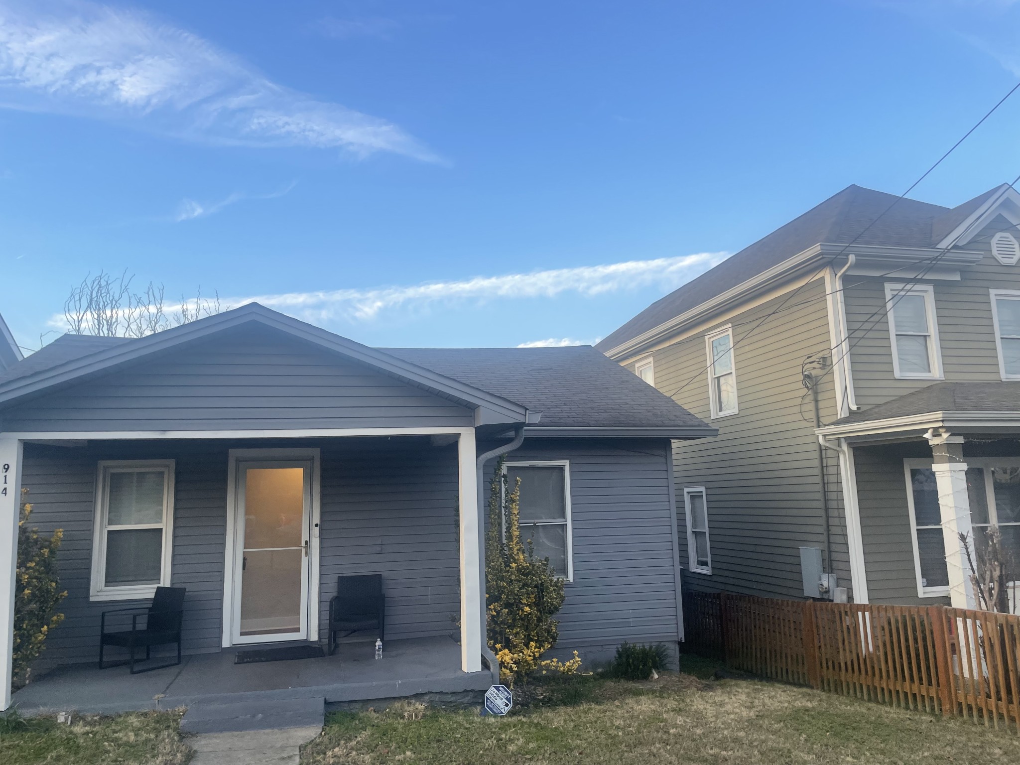 front view of a house with a yard
